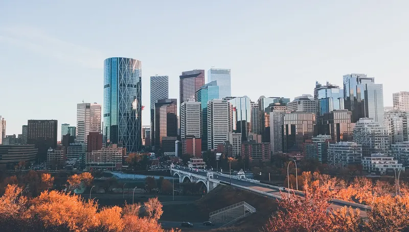 Downtown Calgary and the Bow River seen from the Crescent Heights viewpoint in autumn.